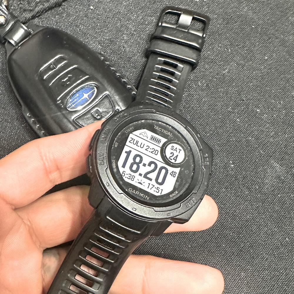 Black garmin instinct rugged tactical watch